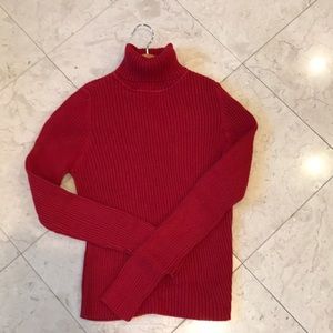 Red ribbed turtleneck sweater